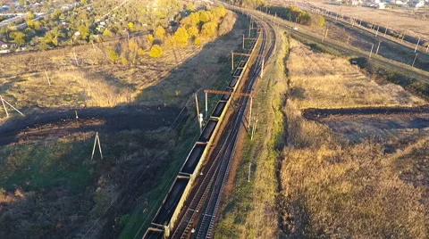 View from the sky on a freight train loaded with coal, unmanned flight over the 스톡 동영상 68730117