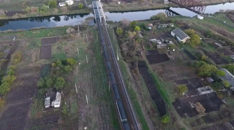 View from the sky on a freight train loaded with coal, unmanned flight over the 스톡 동영상 68775226