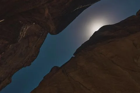 View of the sky from inside an imposing red canyon in 2024 Stockfoto's