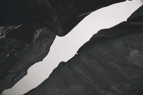 View of the sky from inside an imposing red canyon in 2024 in black and white  Photos
