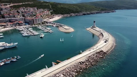 View from the sky of the lighthouse and the breakwater Stock Footage 208080913