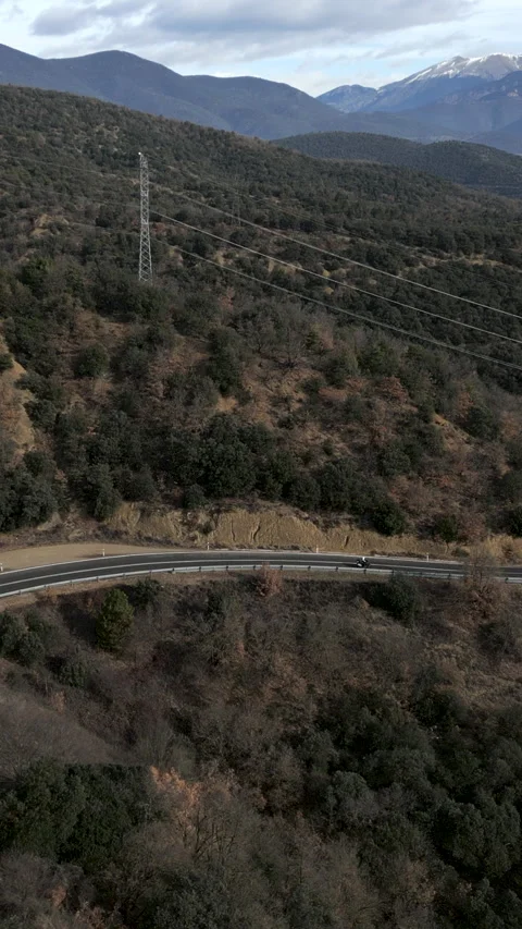 View from the sky of a road in a forest Stock Footage 272333735