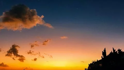 View of the sky at sunset, a combination of aawn, blue sky and dusk in Bali.. Stock Photos