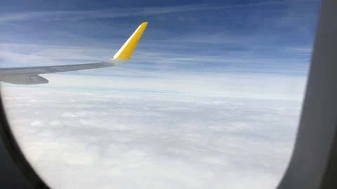 View of the sky through airplane illuminator Stock Footage 87732179