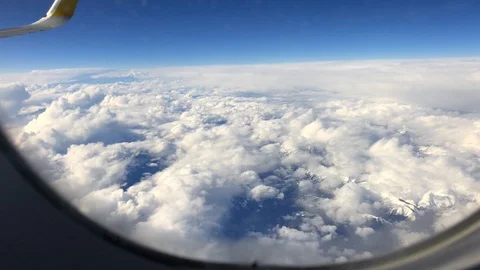 View of the sky through airplane illuminator Stock Footage 87732261