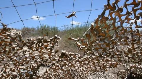 View of the sky through a camouflage net Stock Footage 155865152