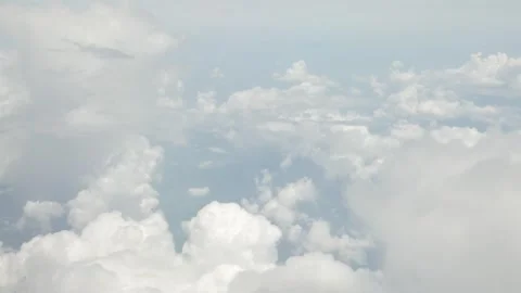 View of sky with white puffy cloud and sun light above sky Stock Footage 246172520