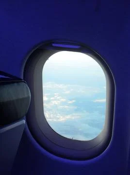 View of the sky from the window of an airplane  Stock Photos