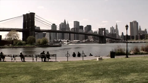  View of skyline and Brooklyn bridge over East River in New York Stock Footage 49224239