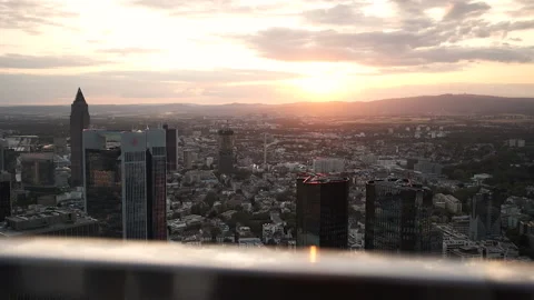 View from the skyscraper on the city from a height during the summer sunset Stock Footage 195035701