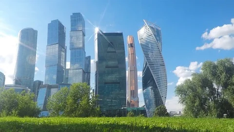 View of skyscrapers from the park timelapse Stock Footage 81604790