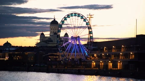 View of skywheel and cathedral Stock Footage 94550697