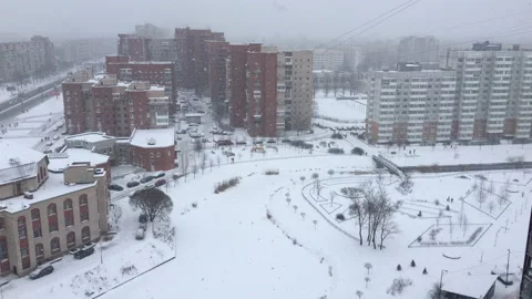 View of a sleeping area on a cloudy winter day, a frozen river. Russia Stock Footage 166199901