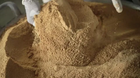 View of slow motion of hand taking palm sugar powder Stock Footage 261931011