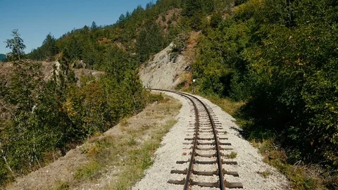 View from slow train passing through tunnel in the mountains Stock Footage 87630907