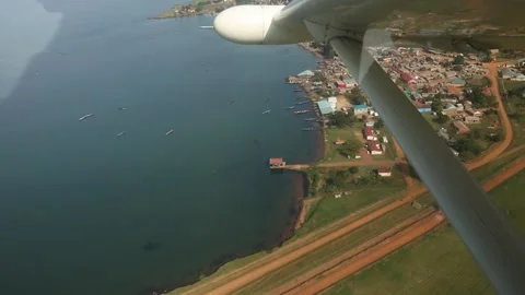 View From Small Airplane Window Banking Over African Landscape Vídeo Stock 233457574