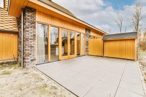 View of a small backyard of a modern cottage Stock Photos