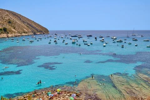 View of a small beautiful bay with clear turquoise water Stock Photos