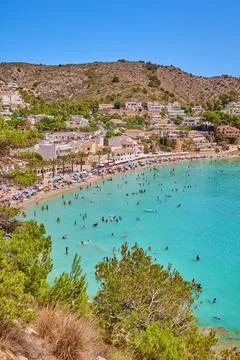 View of a small beautiful sandy beach with clear turquoise water Stock Photos