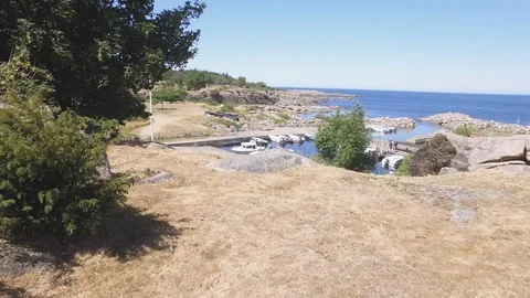 View to the small boats harbour north of Svaneke Stock Footage 102109030