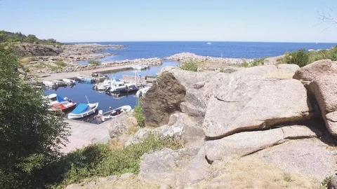 View to the small boats harbour north of Svaneke Stock Footage 102109516