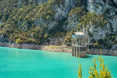 View of a small building guarding the Bovilla Lake dam in Albania Stock Photos