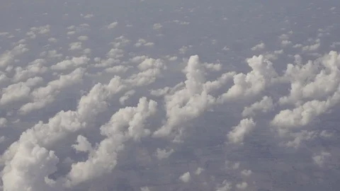 View on small clouds from airplane over rural areas of Thailand Stock Footage 88477861