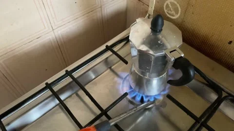 View of a small coffee machine (Italian Mocha) preparing a morning coffee. Stock Footage 141719224