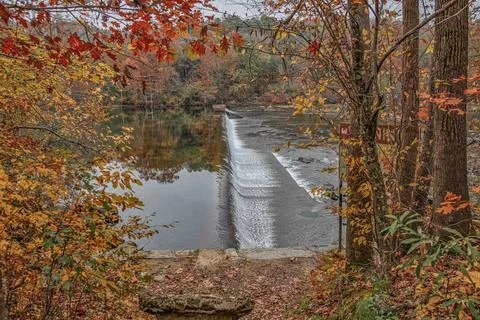 View of small dam on Mountain Fork river in Broken Bow, Oklahoma. Stock Photos