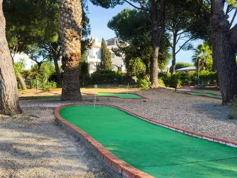 View of small empty golf course Stock Photos