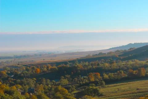 A view at a small mountain valley on a nice sunny day Stock Photos