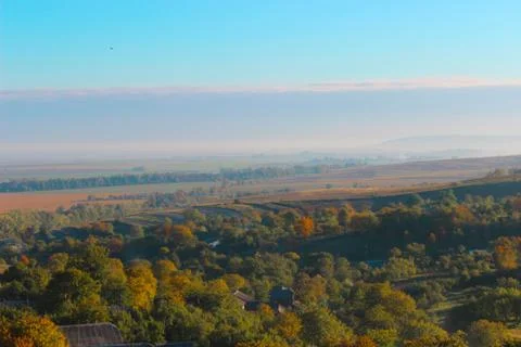 A view at a small mountain valley on a nice sunny day Stock Photos