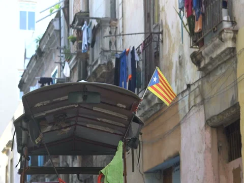 View of small Puerto Rico flag which flutters on wind over the roof in central Video stock 69784319