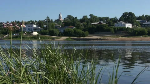 View on small russian town from other riverside Stock Footage