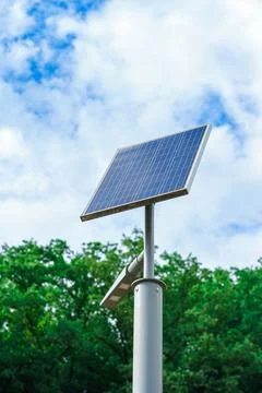View of a small solar panel against the sky for generating electricity Stock Photos