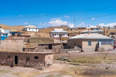 The view of small soviet age remote village in Kyrgyzstan Stock Photos