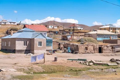 The view of small soviet age remote village in Kyrgyzstan Фото