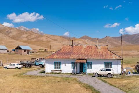 The view of small soviet age remote village in Kyrgyzstan Stock Photos