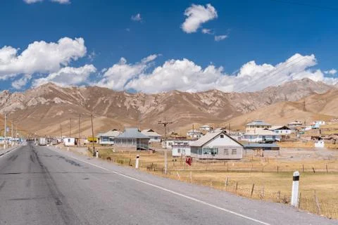The view of small soviet age remote village in Kyrgyzstan Stock Photos