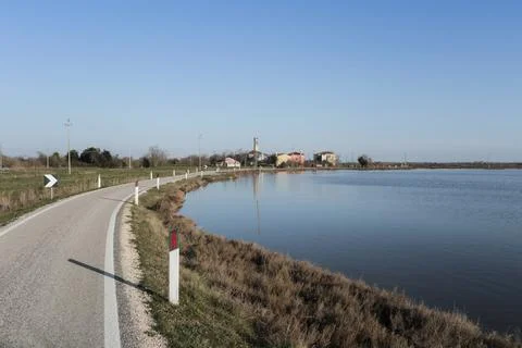View of the small town of Lio Piccolo among the salt marshes in the Venetia.. Stock Photos