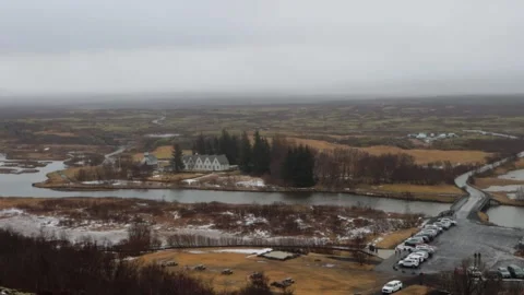 A view of a small town with a river running through it 動画素材 305873194