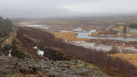 A view of a small town with a river running through it Stock Footage 305873244