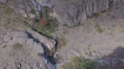 View of a small waterfall near the trail to cerro torre lookout in los glaciares Stock Footage 291830571