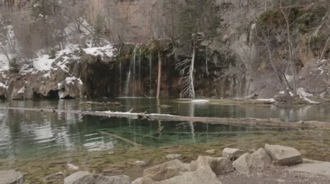 View of a small waterfall in the snowy area Stock Footage 66249342