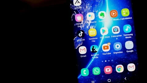 View of a smartphone,google gmail app email surfing,news,dark theme Stock Footage 126277137