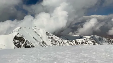 View of the snow-capped mountain peaks near Lenin Peak Stock Footage 208666286