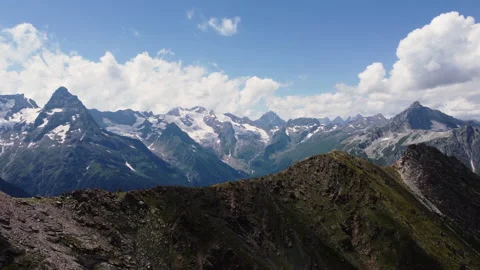 View of the snow-capped peaks of the Caucasus mountains Vídeo Stock 232455189