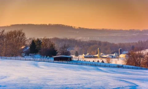 View of snow-covered farm fields and the pigeon hills near spring grove, penn Stock Photos