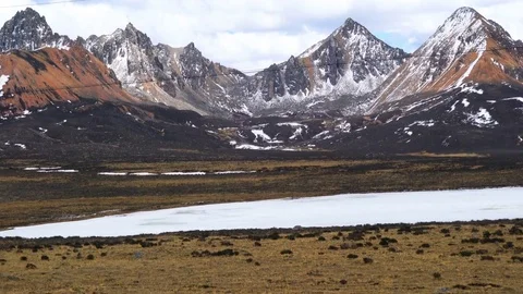 View of snow mountain and frozen lake Stock Footage