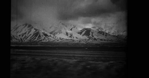 View of snowcapped mountain and The Boeing B-17 Flying Fortress Stock Footage